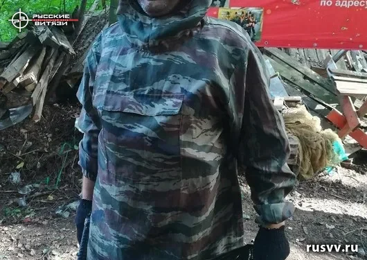 Пейнтбол на лесной площадке в Вологде: команда на игре